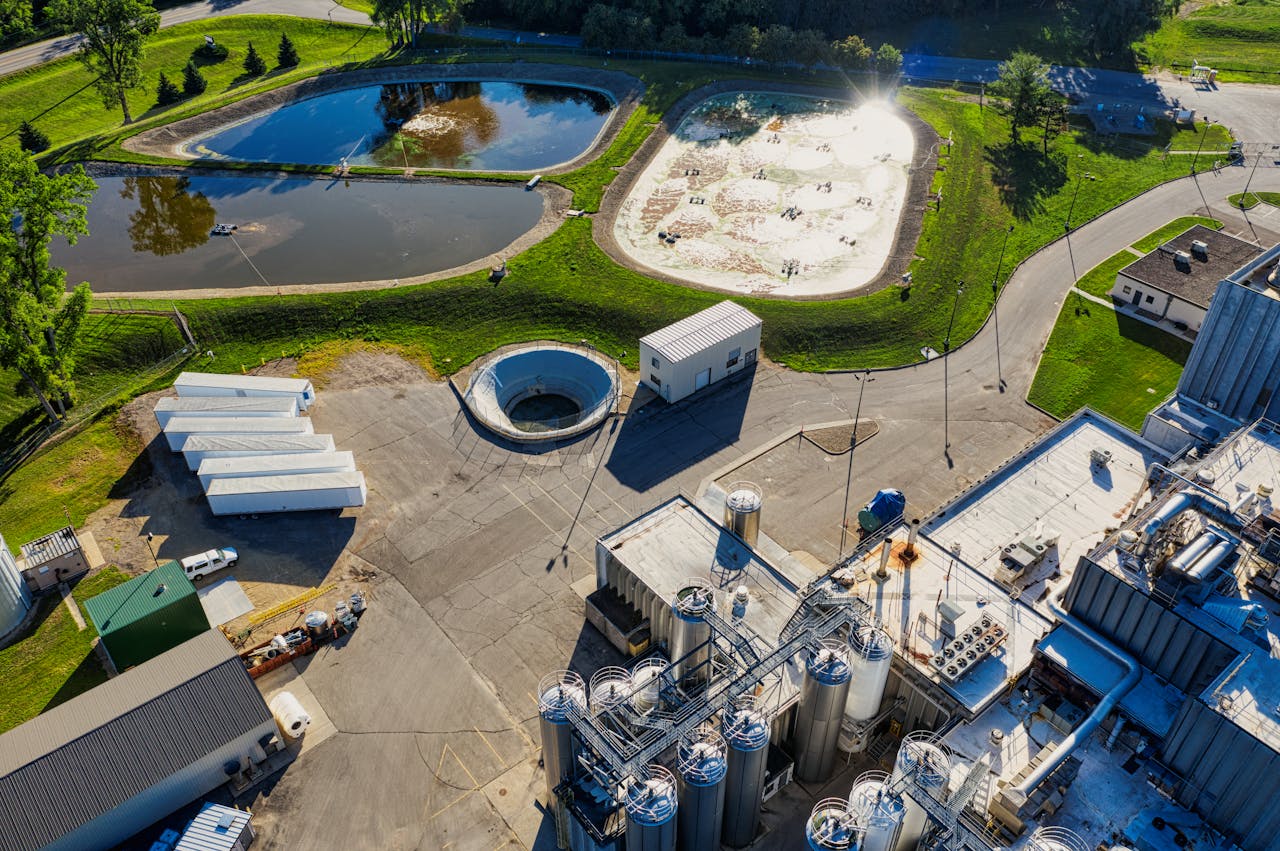 Aerial shot of a factory complex with reflective ponds in Bay City, WI.